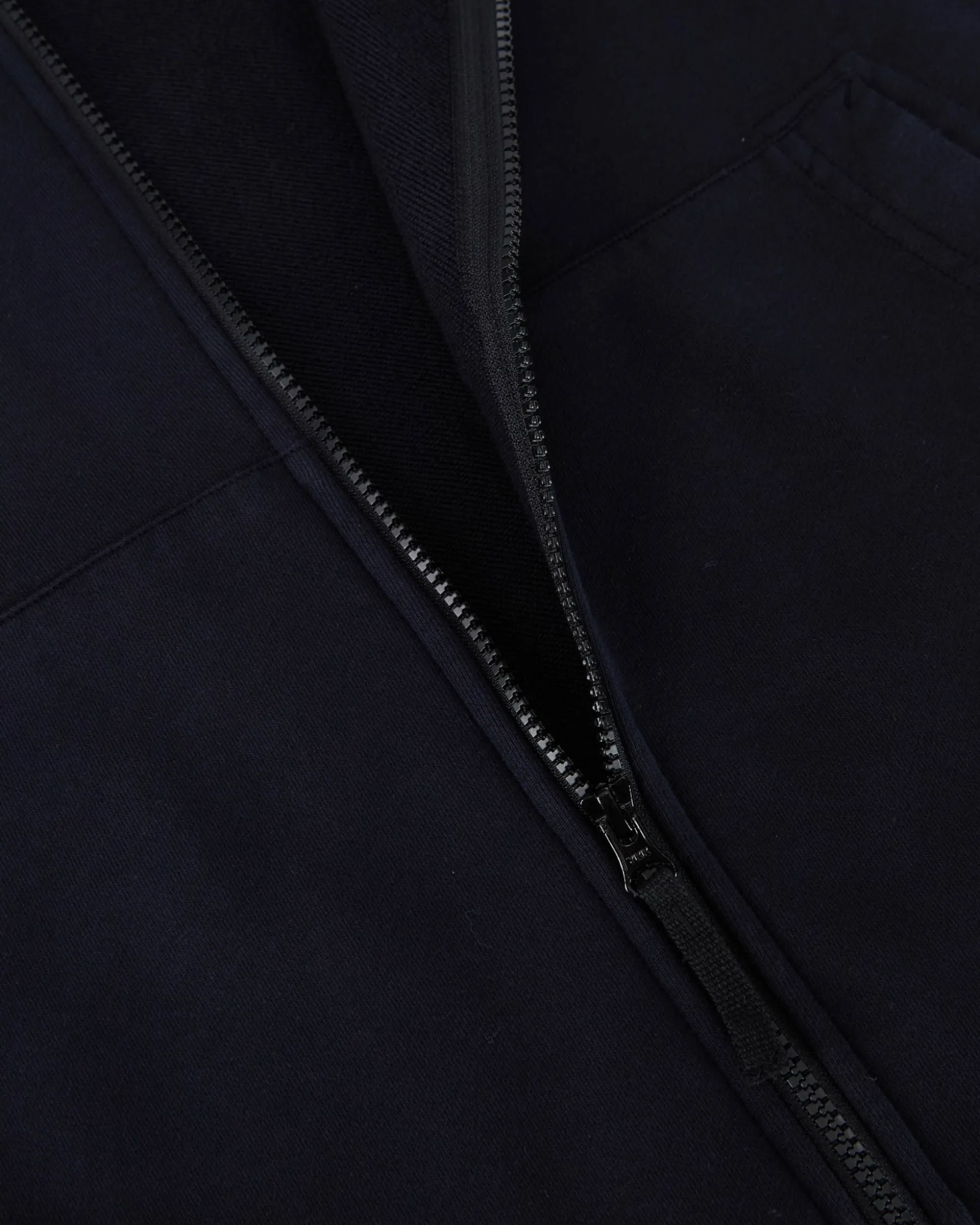 felpa_blu_con_zip_e_cappu_5.webp Felpa Blu con Zip e Cappuccio