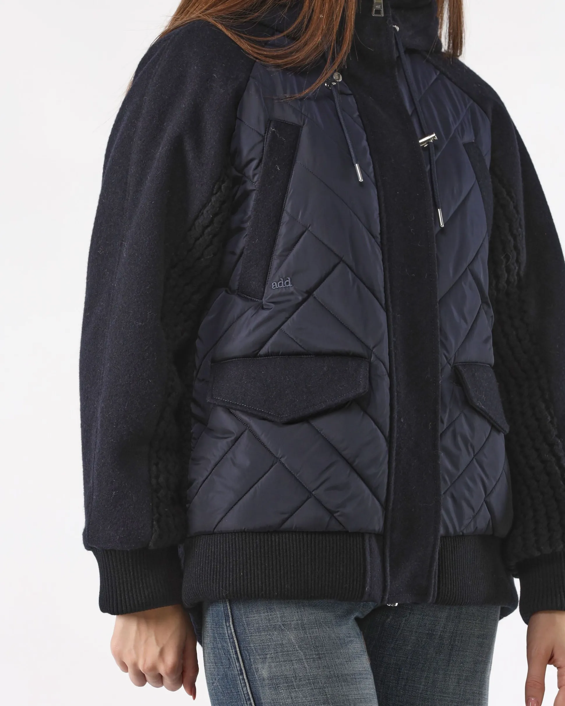piumino_blu_oversized_con_3.webp Piumino Blu Oversized con Cappuccio