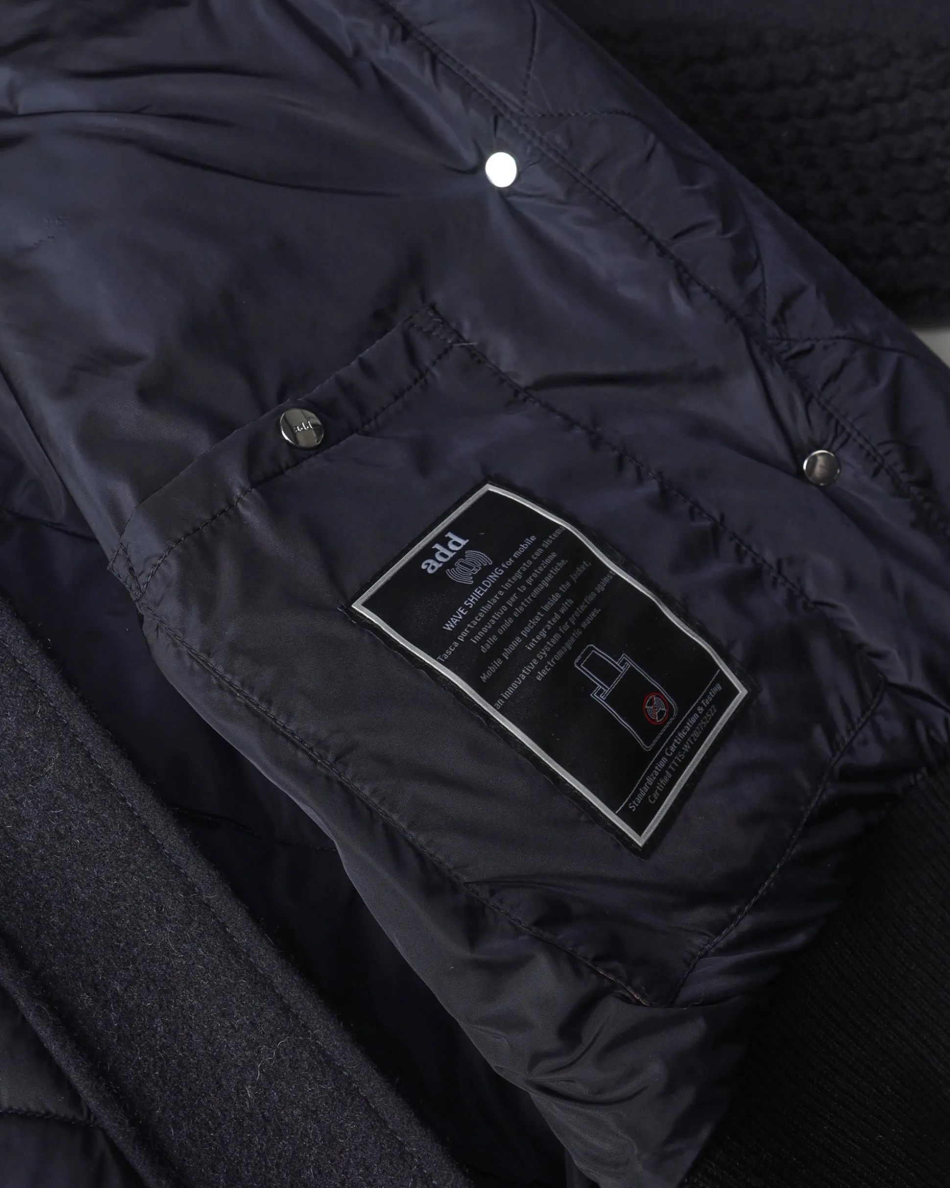 piumino_blu_oversized_con_5.webp Piumino Blu Oversized con Cappuccio