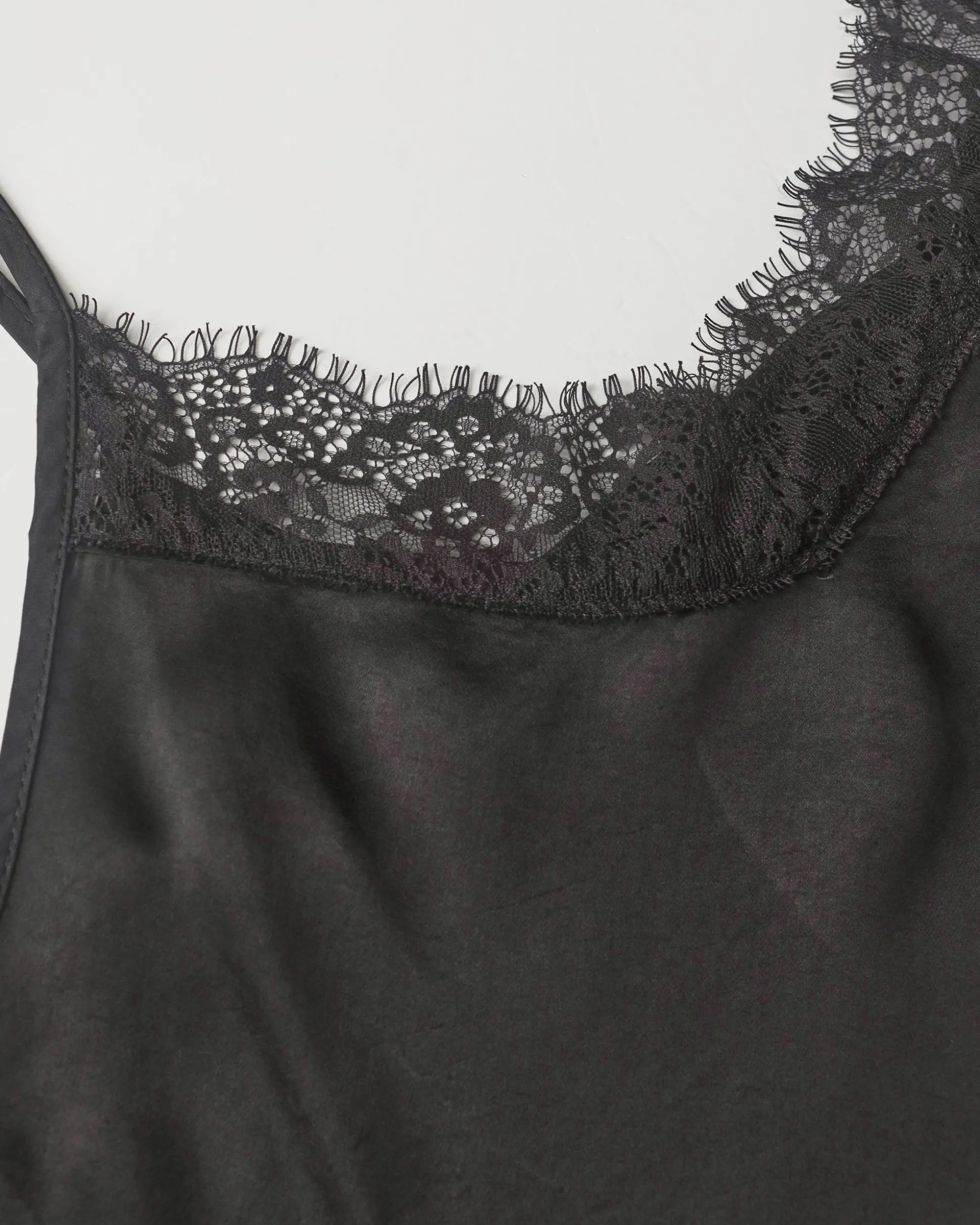 top_unito_con_pizzo_nero_5-1.webp Top unito con pizzo nero